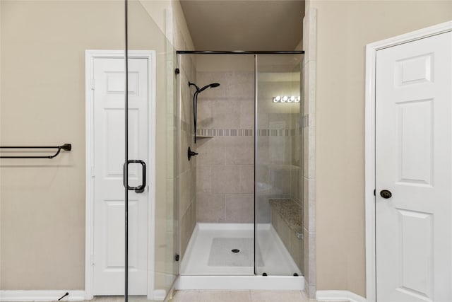 399 Black Walnut Dr, Conroe, TX 77304 - bathroom with a shower stall and baseboards
