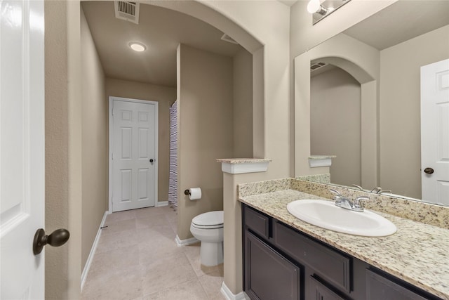 399 Black Walnut Dr, Conroe, TX 77304 - bathroom featuring vanity, toilet, baseboards, tile patterned flooring, and curtained shower