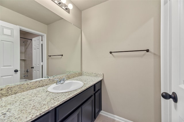 399 Black Walnut Dr, Conroe, TX 77304 - bathroom featuring vanity, baseboards, and washtub / shower combination