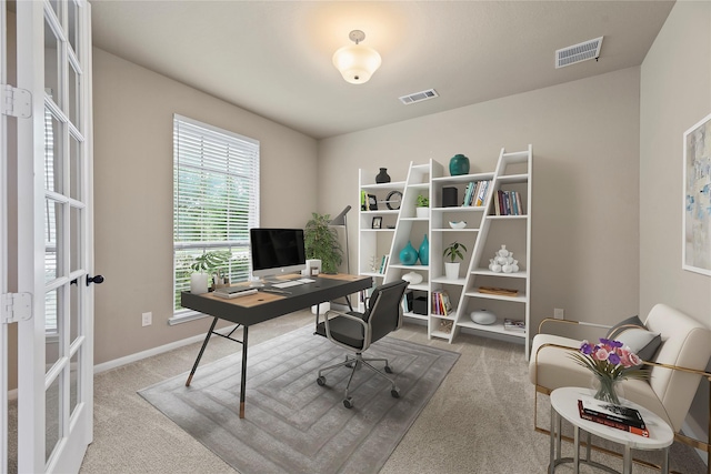 399 Black Walnut Dr, Conroe, TX 77304 - office area featuring carpet floors, plenty of natural light, baseboards, and french doors
