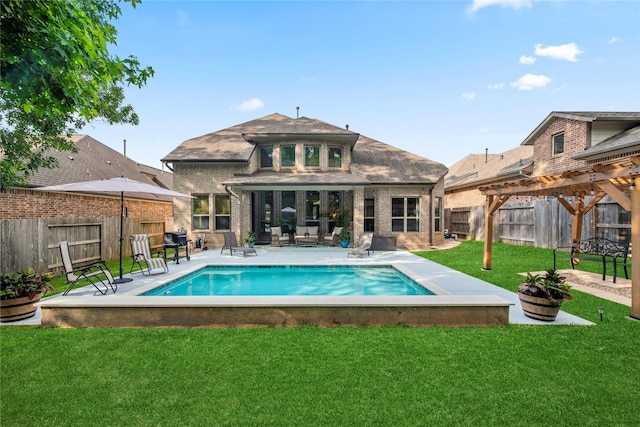 399 Black Walnut Dr, Conroe, TX 77304 - back of property with a pergola, brick siding, a patio, and roof with shingles