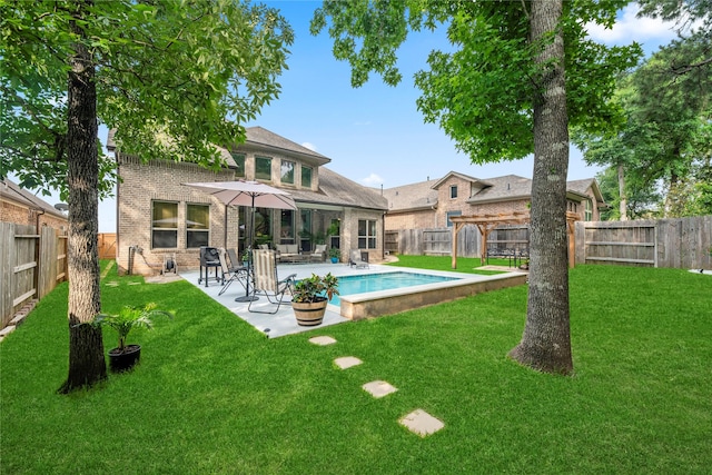 399 Black Walnut Dr, Conroe, TX 77304 - back of house with brick siding and a patio area