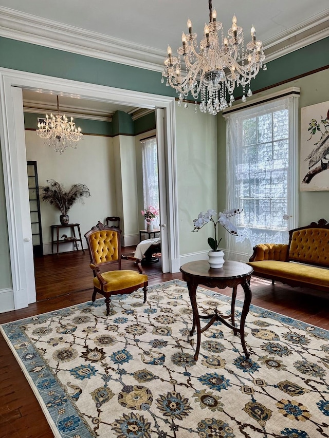 1309 Broadway St, Galveston, TX 77550 - living area with a chandelier, ornamental molding, wood finished floors, and baseboards