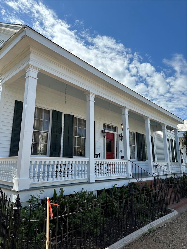 1309 Broadway St, Galveston, TX 77550 - view of property exterior with covered porch