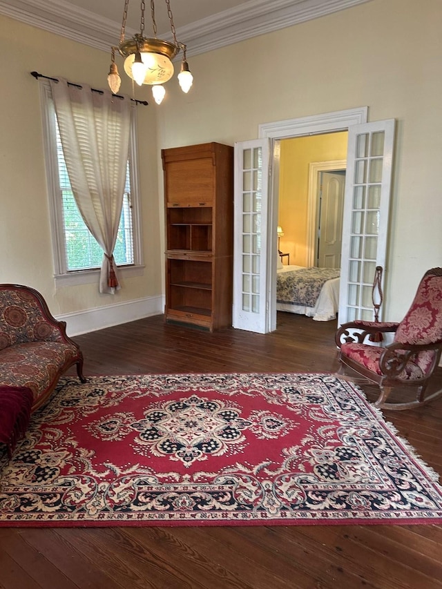 1309 Broadway St, Galveston, TX 77550 - living area featuring wood-type flooring and crown molding