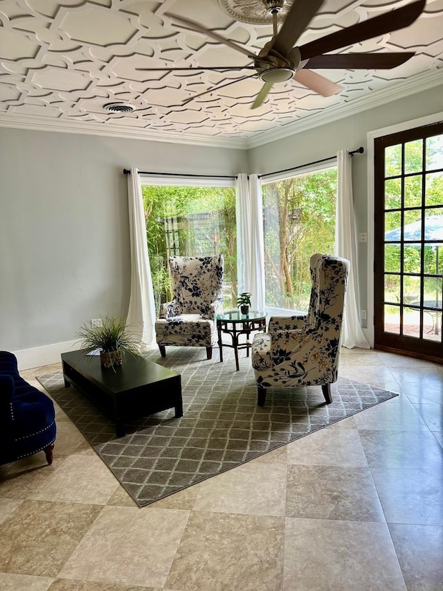 1309 Broadway St, Galveston, TX 77550 - living room with crown molding and a ceiling fan