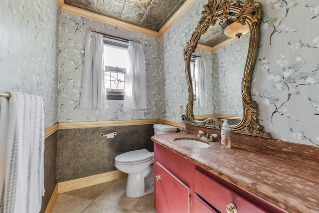 1309 Broadway St, Galveston, TX 77550 - bathroom featuring crown molding, toilet, vanity, and wallpapered walls