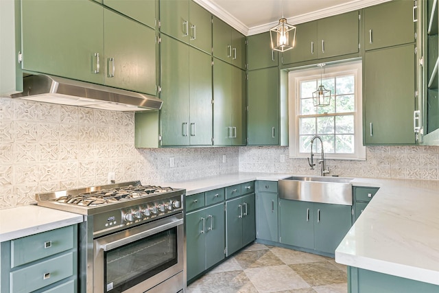 1309 Broadway St, Galveston, TX 77550 - kitchen featuring stainless steel gas range oven, under cabinet range hood, a sink, tasteful backsplash, and light countertops
