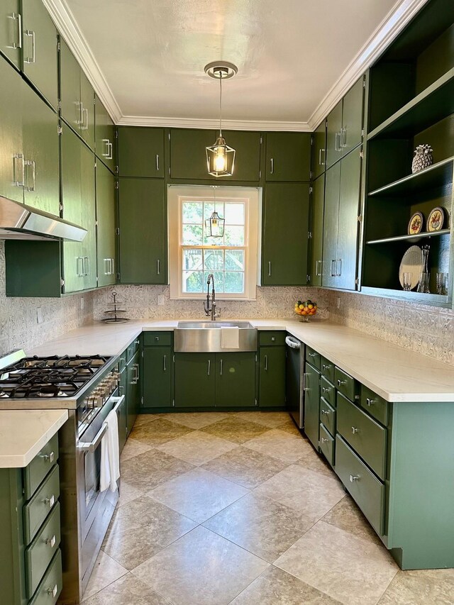 1309 Broadway St, Galveston, TX 77550 - kitchen with stainless steel appliances, a sink, under cabinet range hood, green cabinets, and ornamental molding
