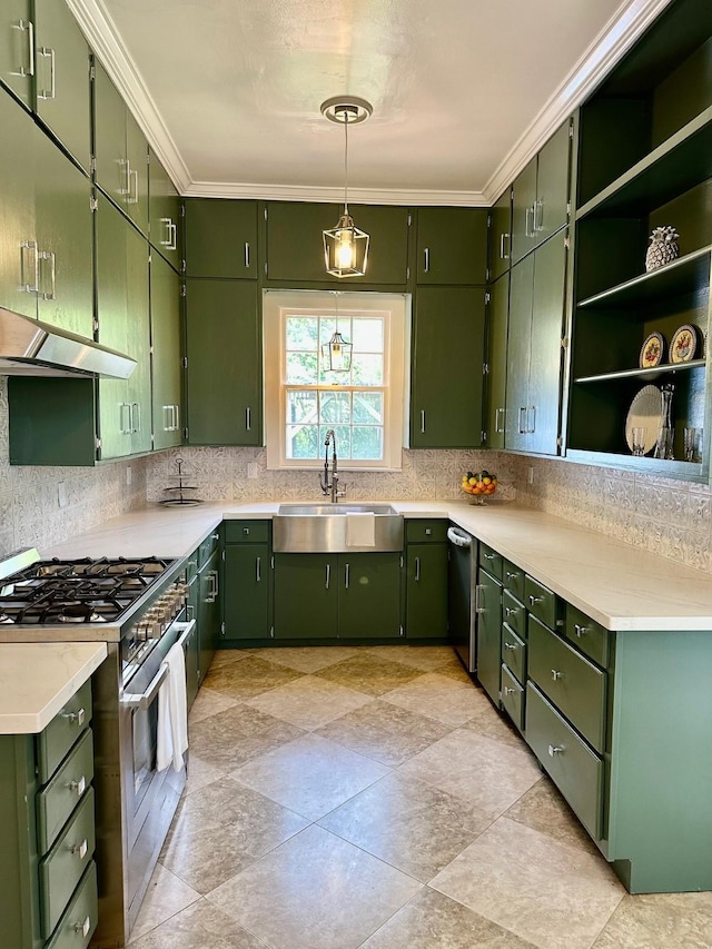 1309 Broadway St, Galveston, TX 77550 - kitchen featuring stainless steel appliances, a sink, under cabinet range hood, backsplash, and green cabinetry