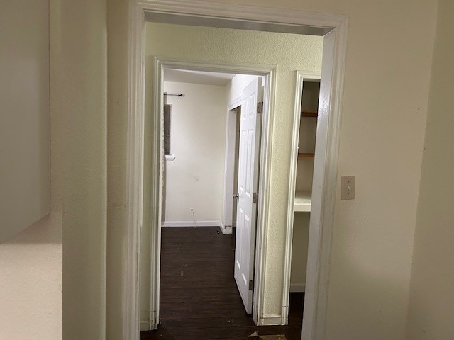 6619 Carver Ave, Hitchcock, TX 77563 - hall with dark wood-style floors and baseboards