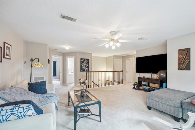 19 Remington Park, Katy, TX 77493 - living area with light colored carpet and ceiling fan
