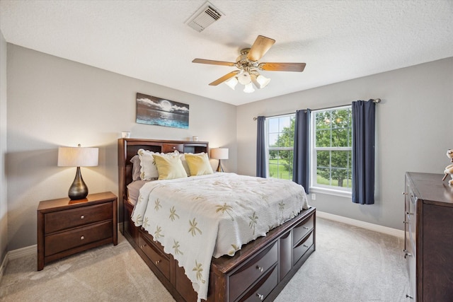 19 Remington Park, Katy, TX 77493 - bedroom featuring light carpet, baseboards, and ceiling fan