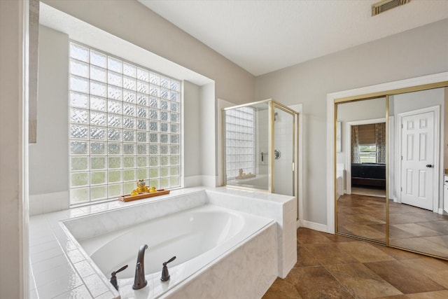 19 Remington Park, Katy, TX 77493 - bathroom with a shower stall and a garden tub