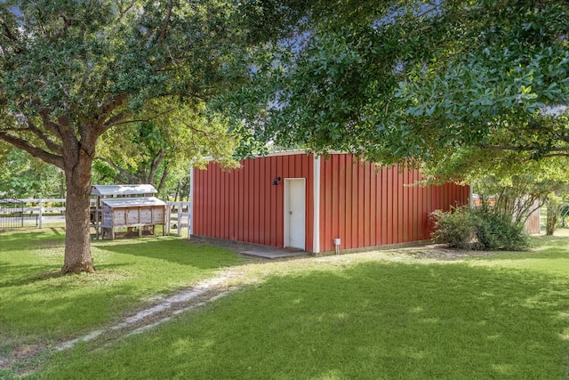 19 Remington Park, Katy, TX 77493 - view of yard featuring an outbuilding and a detached garage