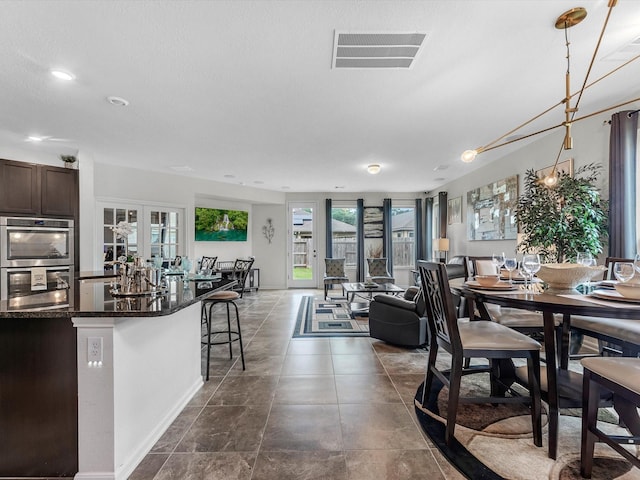 14306 Cedar Pine Ct, Houston, TX 77068 - dining space with baseboards and recessed lighting