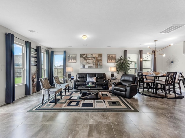 14306 Cedar Pine Ct, Houston, TX 77068 - living area featuring baseboards and a chandelier