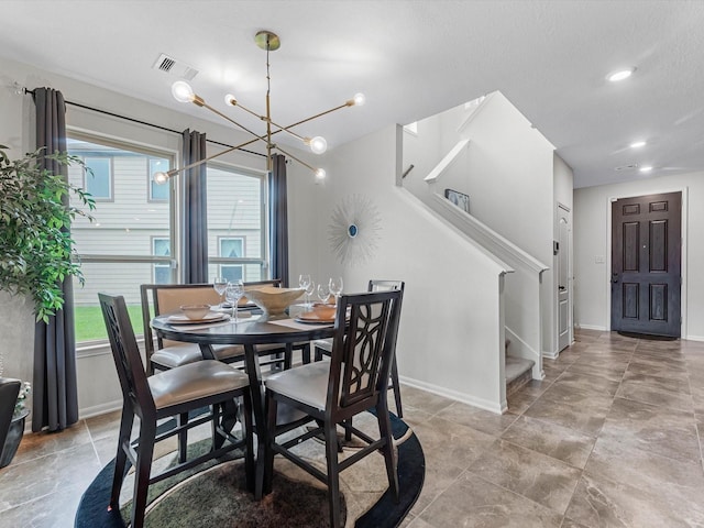 14306 Cedar Pine Ct, Houston, TX 77068 - dining space featuring plenty of natural light, stairway, a chandelier, baseboards, and recessed lighting
