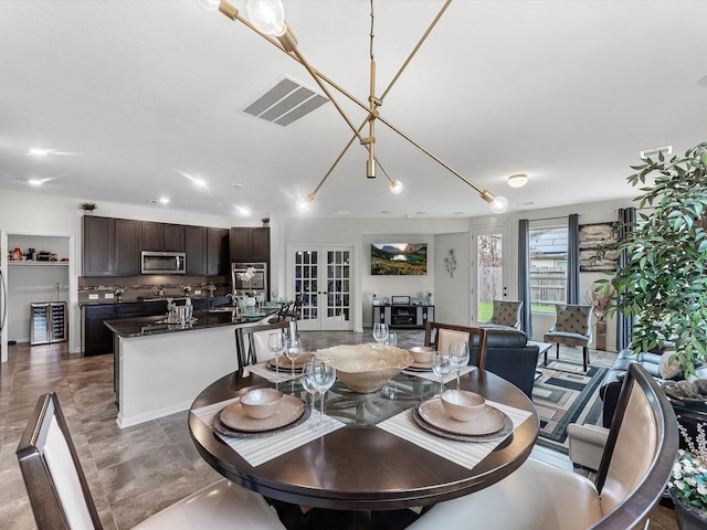 14306 Cedar Pine Ct, Houston, TX 77068 - dining area featuring french doors and recessed lighting