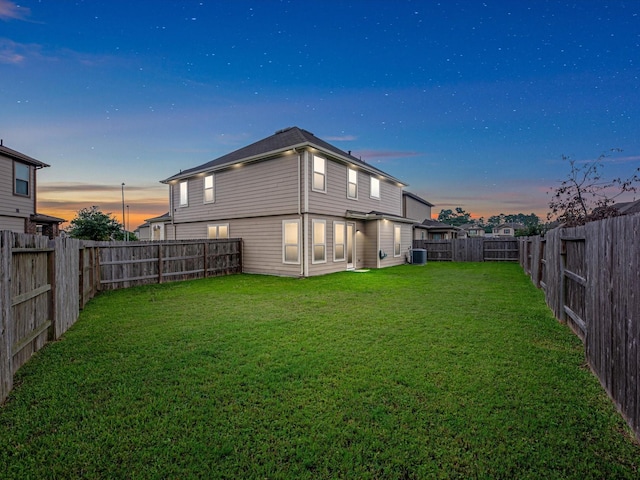 14306 Cedar Pine Ct, Houston, TX 77068 - back of house at dusk with central AC