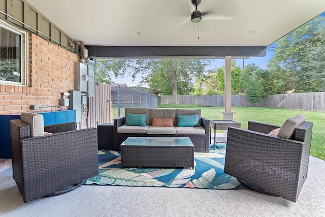 1240 Oakcrest Cir, Beaumont, TX 77706 - view of patio featuring an outdoor living space and ceiling fan