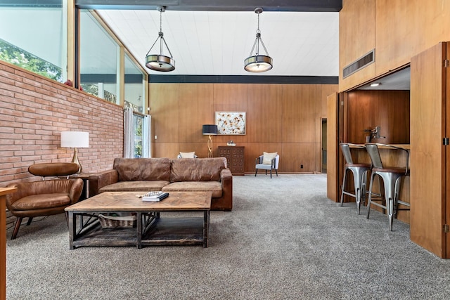 1240 Oakcrest Cir, Beaumont, TX 77706 - living room with carpet floors and wooden walls