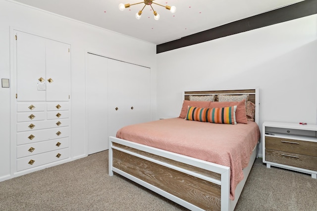 1240 Oakcrest Cir, Beaumont, TX 77706 - bedroom with carpet flooring, a chandelier, and a closet
