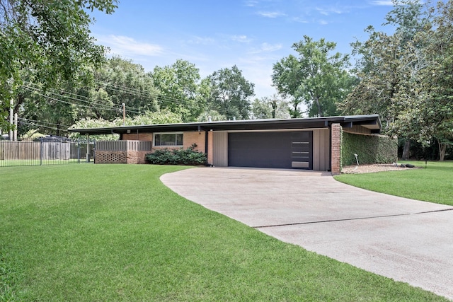 1240 Oakcrest Cir, Beaumont, TX 77706 - view of front of house with driveway, a garage, and brick siding