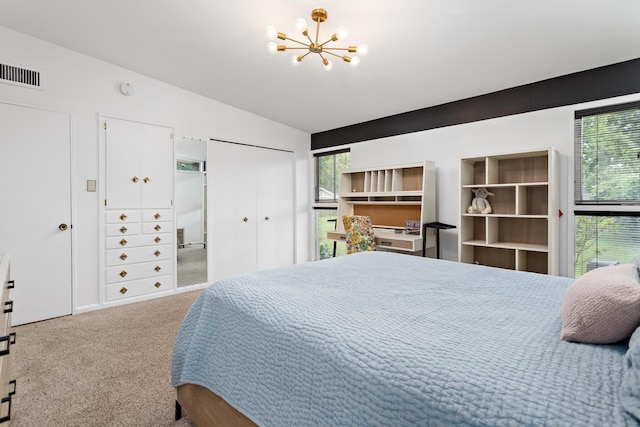 1240 Oakcrest Cir, Beaumont, TX 77706 - carpeted bedroom featuring a chandelier and vaulted ceiling
