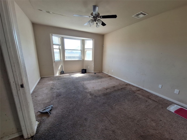 2419 Fort Baldy Trl, Humble, TX 77396 - unfurnished room with carpet floors, a ceiling fan, and baseboards