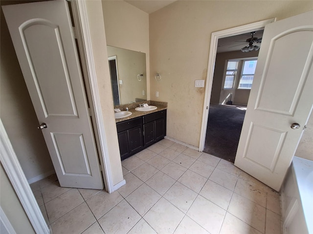 2419 Fort Baldy Trl, Humble, TX 77396 - bathroom featuring double vanity, tile patterned flooring, and a ceiling fan