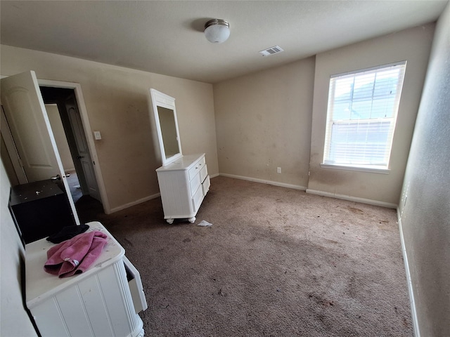 2419 Fort Baldy Trl, Humble, TX 77396 - unfurnished bedroom with carpet flooring and baseboards