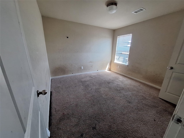 2419 Fort Baldy Trl, Humble, TX 77396 - spare room featuring carpet floors and baseboards