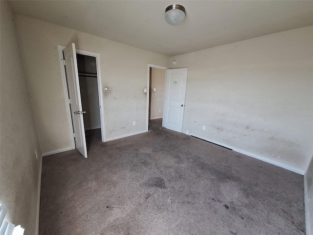 2419 Fort Baldy Trl, Humble, TX 77396 - unfurnished bedroom featuring carpet flooring and baseboards