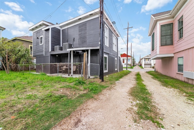 1611 19th St, Galveston, TX 77550 - rear view of house with driveway