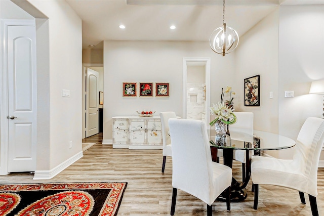 321 Twin Timbers Ln, Kemah, TX 77565 - dining area with a chandelier, light wood-style floors, recessed lighting, and baseboards