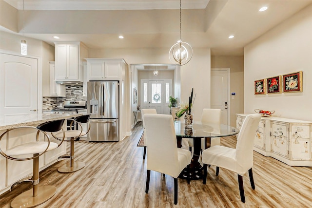 321 Twin Timbers Ln, Kemah, TX 77565 - dining room featuring light wood-style floors and recessed lighting