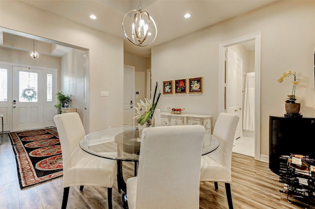 321 Twin Timbers Ln, Kemah, TX 77565 - dining space featuring a chandelier, light wood-type flooring, recessed lighting, and baseboards