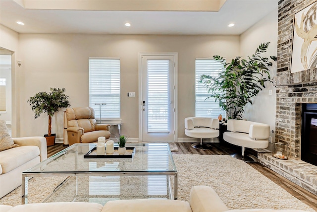 321 Twin Timbers Ln, Kemah, TX 77565 - living room with wood finished floors, a fireplace, plenty of natural light, and recessed lighting
