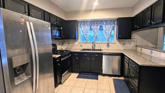 2014 Lexington Woods Dr, Spring, TX 77373 - kitchen with black appliances, a sink, and dark cabinets