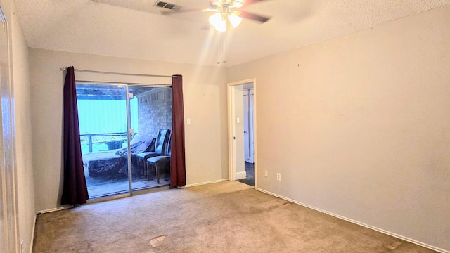 2014 Lexington Woods Dr, Spring, TX 77373 - carpeted spare room featuring ceiling fan, baseboards, and a textured ceiling