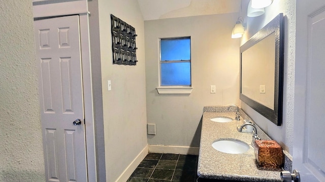 2014 Lexington Woods Dr, Spring, TX 77373 - full bathroom with baseboards, double vanity, and tile patterned flooring