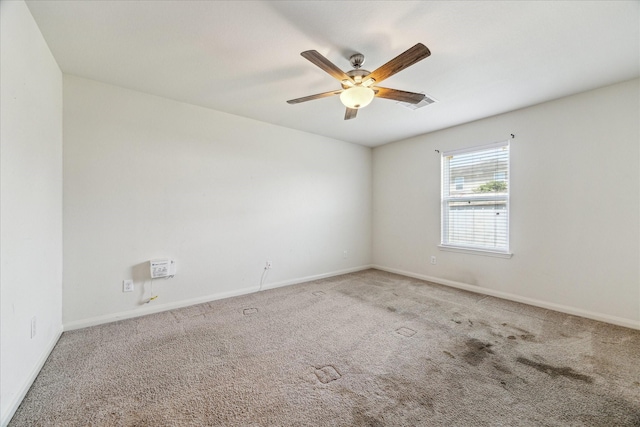 5002 Manor Stone Ln, Rosenberg, TX 77469 - carpeted empty room featuring ceiling fan and baseboards