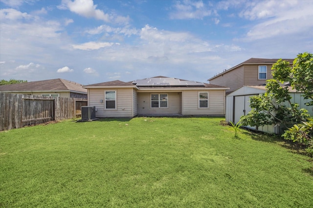 5002 Manor Stone Ln, Rosenberg, TX 77469 - rear view of house featuring central air condition unit and solar panels