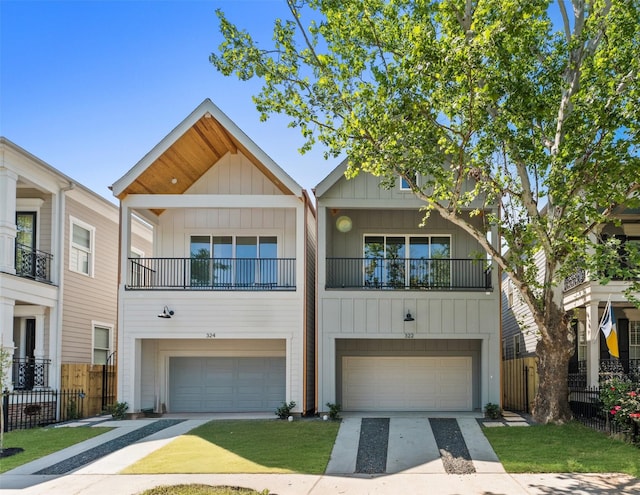 322 Aurora St, Houston, TX 77008 - townhome / multi-family property with board and batten siding, an attached garage, and concrete driveway