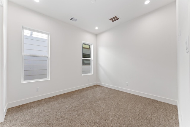 322 Aurora St, Houston, TX 77008 - spare room featuring carpet flooring, recessed lighting, and baseboards