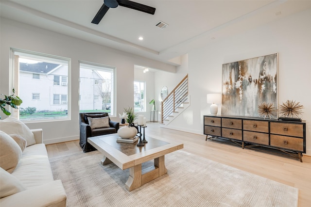 2015 Hopkins St, Houston, TX 77006 - living area featuring stairway, wood finished floors, a ceiling fan, recessed lighting, and baseboards