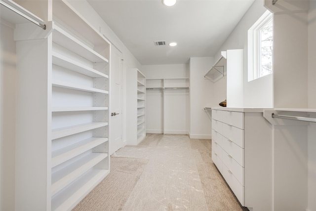 2015 Hopkins St, Houston, TX 77006 - walk in closet featuring light carpet