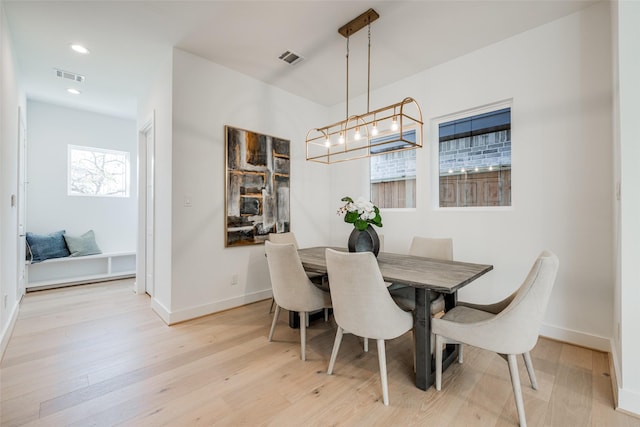 2015 Hopkins St, Houston, TX 77006 - dining space with light wood-style floors, baseboards, and recessed lighting