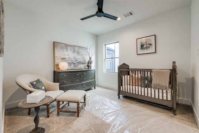 2015 Hopkins St, Houston, TX 77006 - carpeted bedroom featuring baseboards and ceiling fan